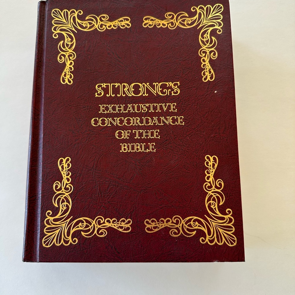 Brown and Gold Coffee Table Book with Ornate Accents